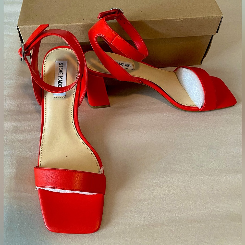 Brand New (never worn) Steve Madden Red Heels.